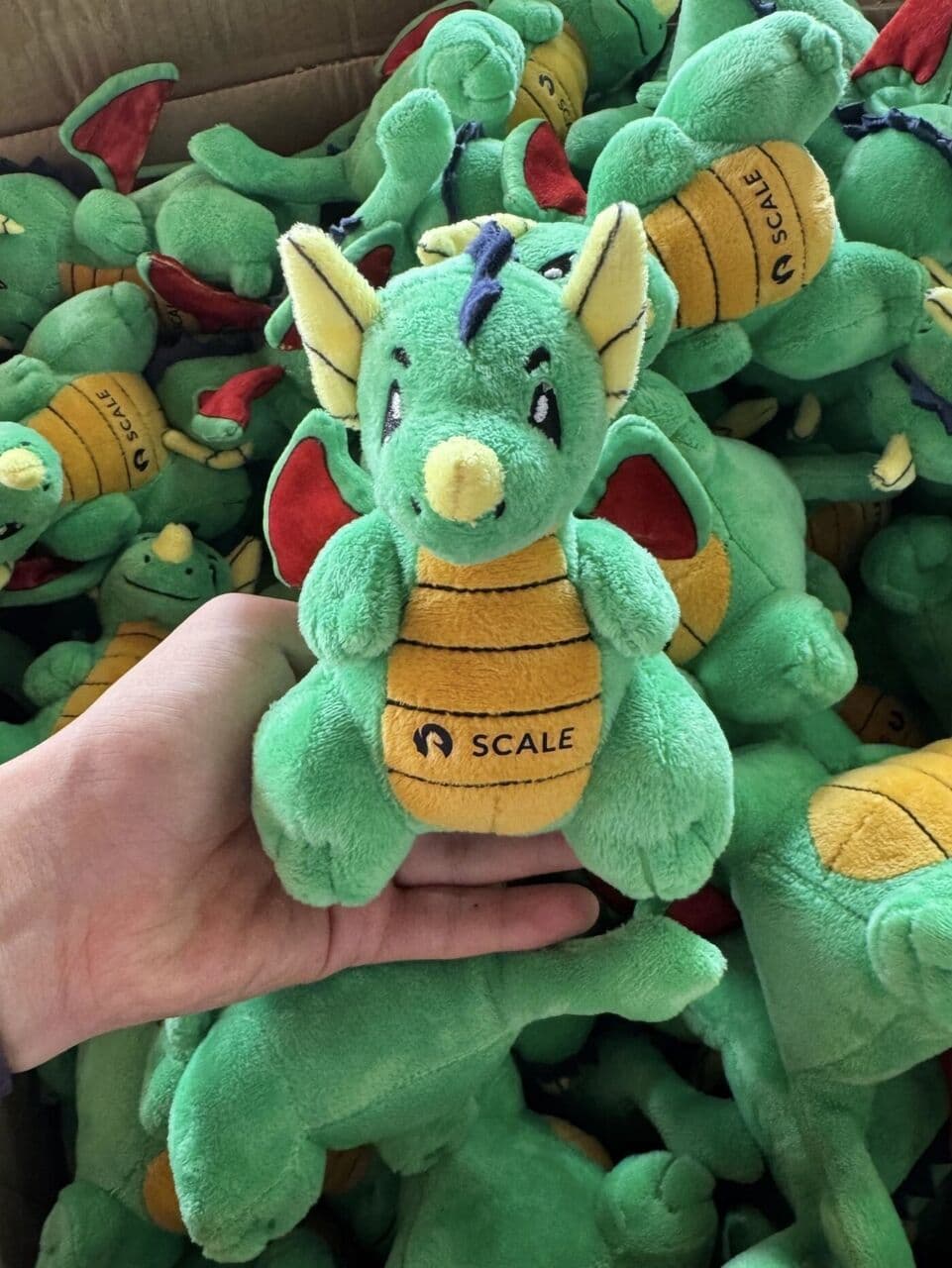 Custom green dinosaur plush toys in mass production